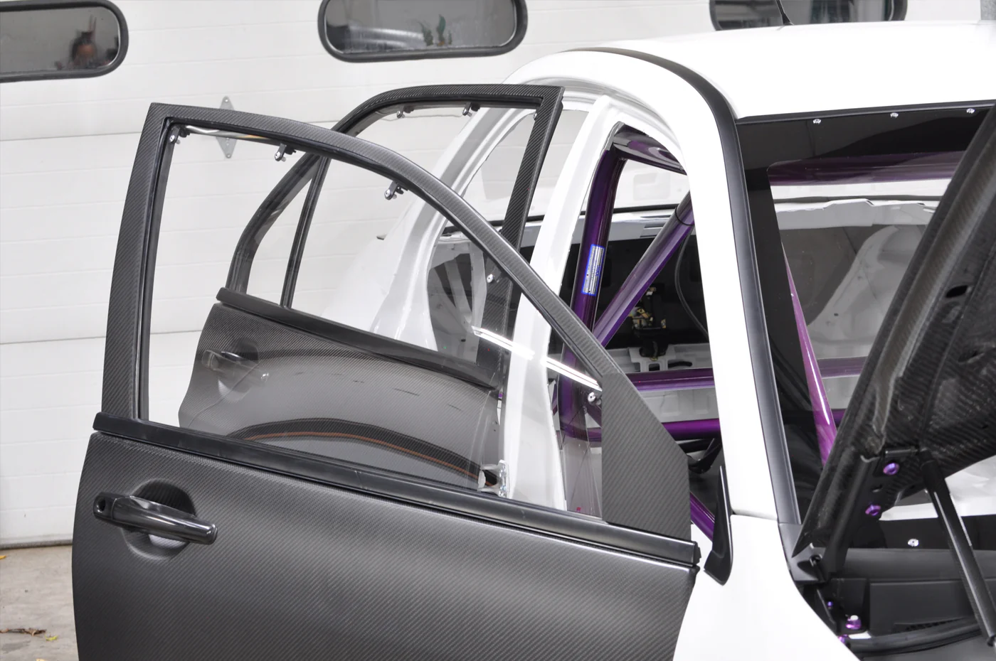 Seibon Carbon Fiber Rear Doors for Evo 7/8/9 (DD0305MITEVO8-R) - Image 5