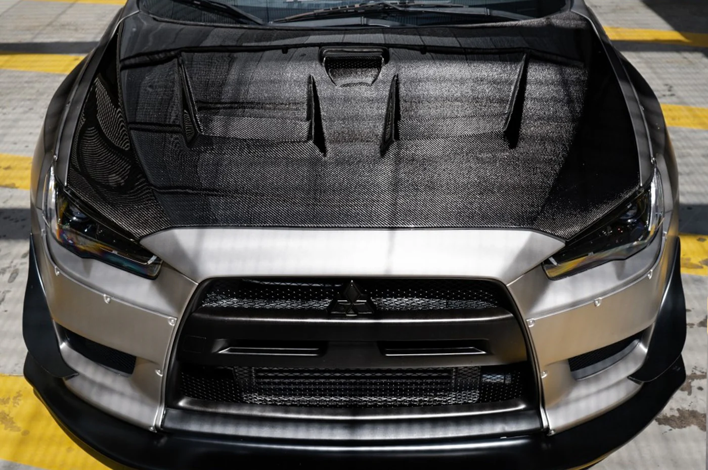 Seibon Carbon Fiber Hood DV Style Gloss for Evo X (HD0809MITEVOX-DV) - Image 10