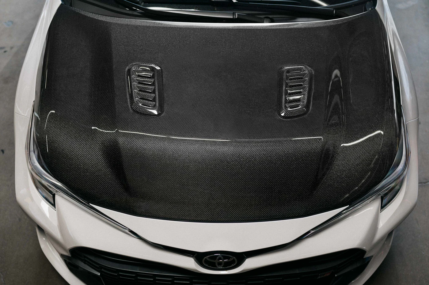Seibon Carbon Fiber Hood for 2023+ GR Corolla (HD23TYGRCOR-OE) - Image 7