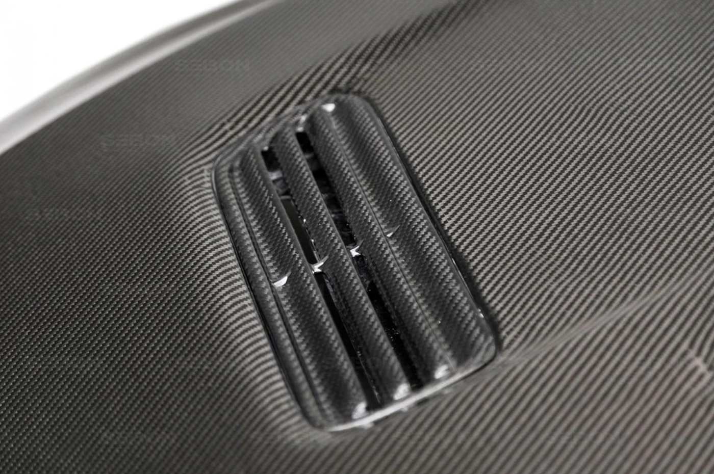 Seibon Carbon Fiber Hood OEM Style Gloss for Evo X (HD0809MITEVOX-OE) - Image 4
