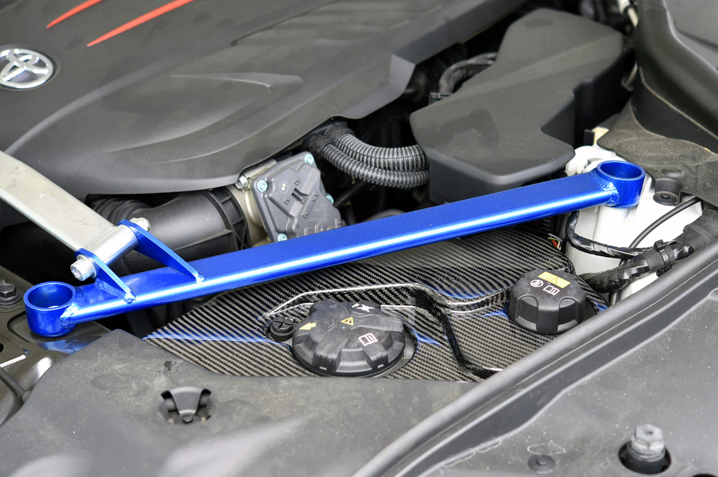 Rexpeed Carbon Fiber Coolant Cover for 2020+ Supra GR (TS41) - Image 3